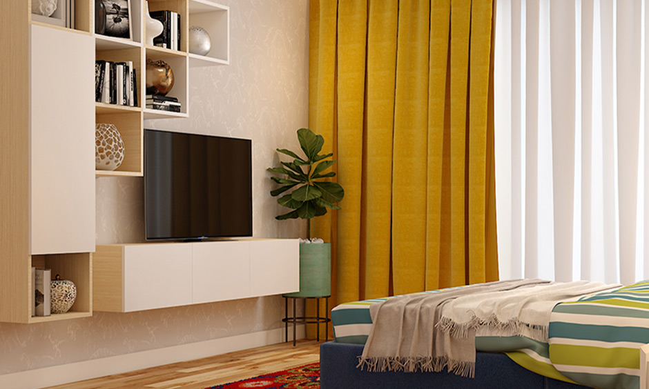 Bedroom wall decor idea that incorporates bookshelves