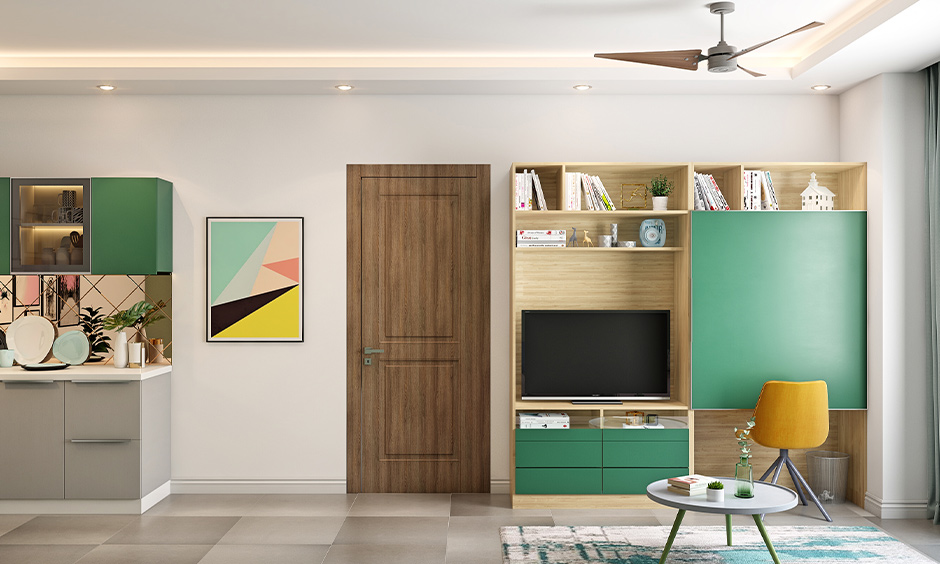 Modern olive green living room with hints of Olive on the tv unit and upholstery