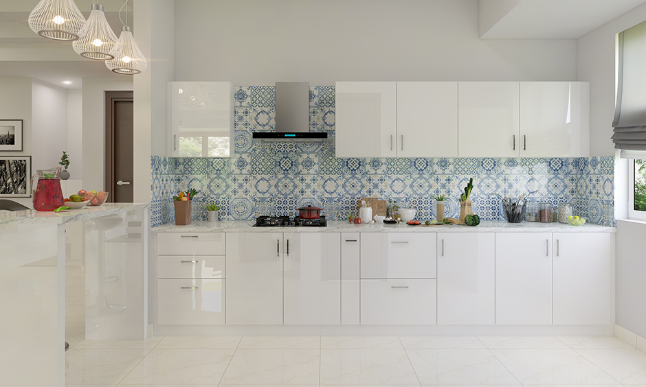 Italian finish design of kitchen wardrobe with all-white and patterned tiles for the backsplash beautifully break.