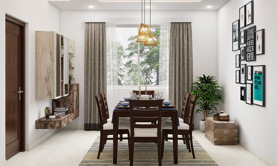 Simple dining room decor with pendant lights above the table for some extra charm and sparkle