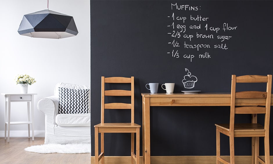 Dining room decor give minimal look with chalkboard paint on the wall