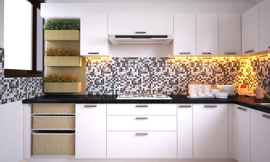 Best kitchen wardrobe designs with monochrome & square backsplash always work its magic.