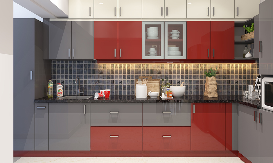 Kitchen wardrobe colour like red instantly enhances a colour combination of dull grey and white kitchen cabinets.