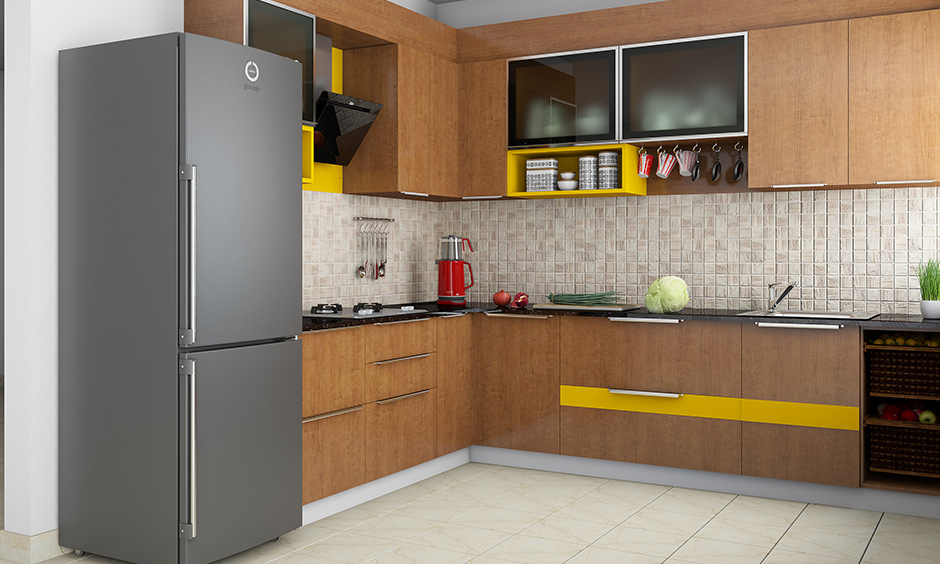 Wooden wardrobe designs for kitchen with a hint of yellow colour adds a modern twist to kitchen wardrobe.
