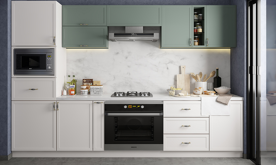One wall kitchen with white cabinets against splash of grey tinge wall and marble backsplash look elegant
