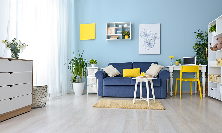 Shades of blue for living room pastel wall colors with a lot of soft whites furniture brings freshness to the place.