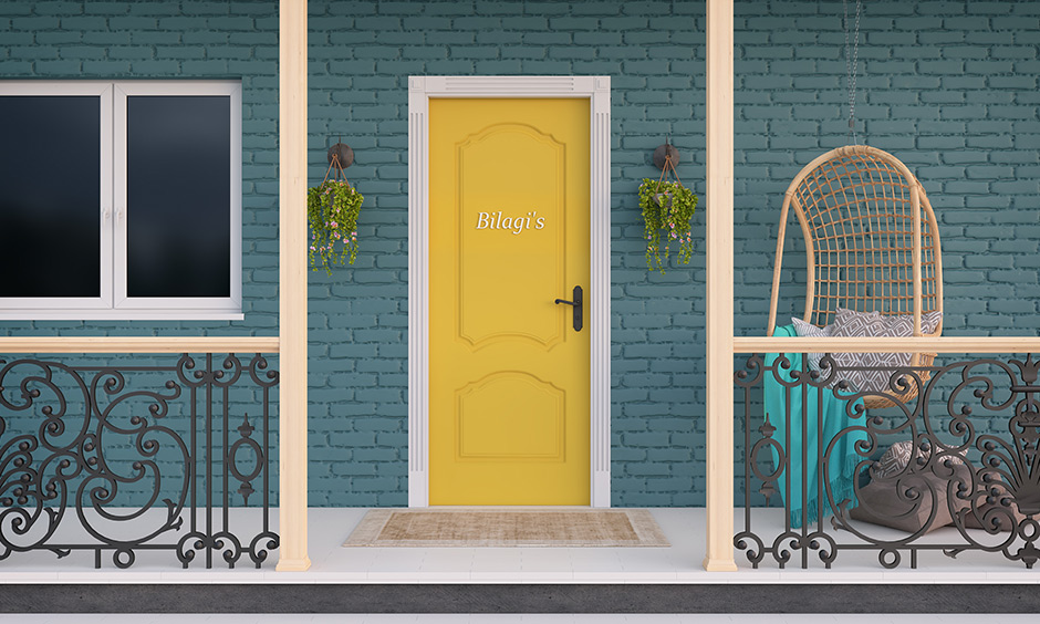 Mustard yellow colour on front door to brighten your home's entrance