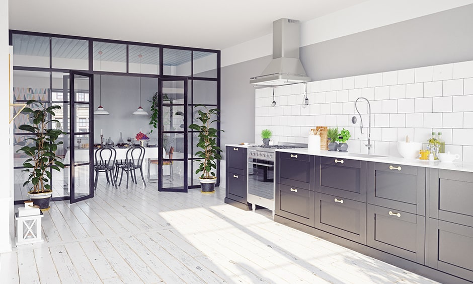 Glass partition design for kitchen gives an extraordinary look to open kitchen designs