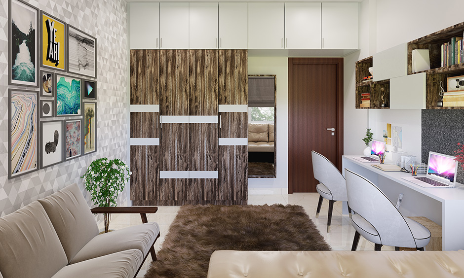 Wardrobe colour designed in natural brown finish with white highlight combination in the bedroom.
