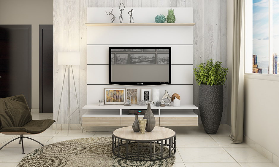 Panelled wall accents for living room against tv unit