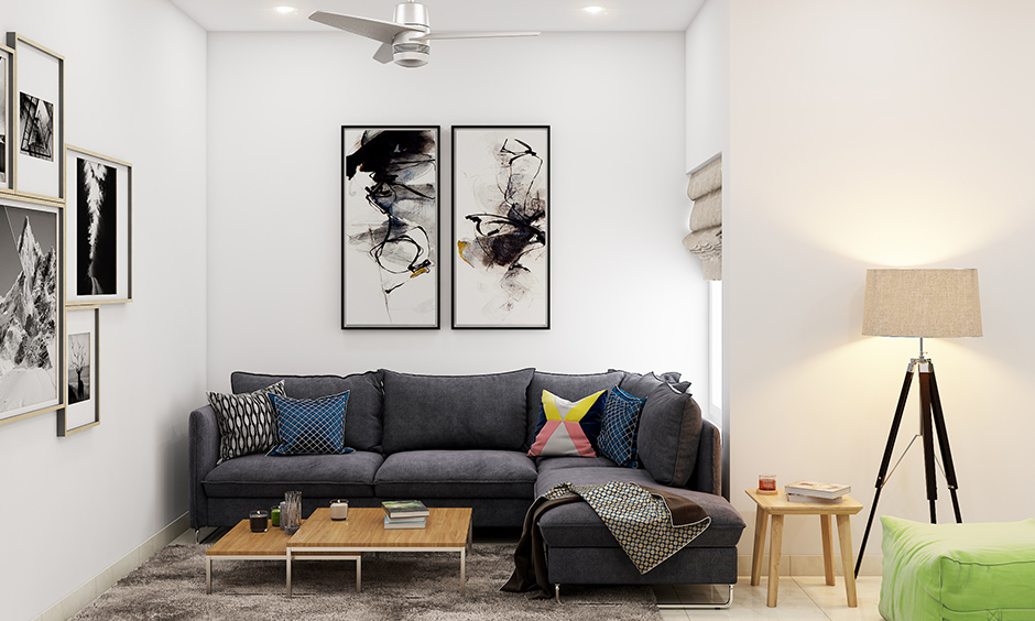 Thrown assorted pillows on the sofa in contrasting colours and patterns is DIY home decor ideas for living room