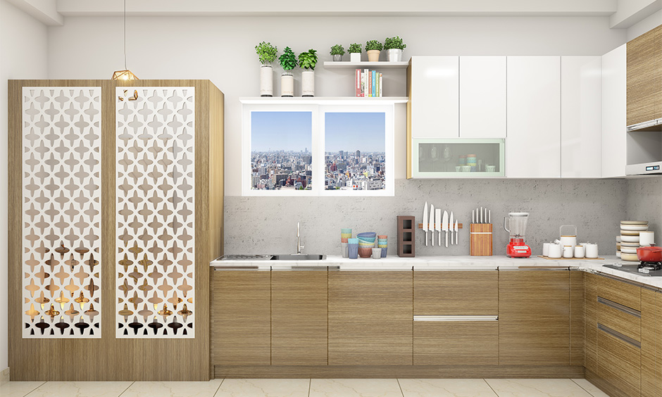 Pooja room in kitchen designs designed with criss-cross patterned doors made with wood