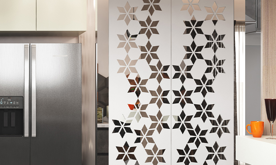 Pooja room in kitchen ideas designed with a floral pattern giving you just the right amount of space