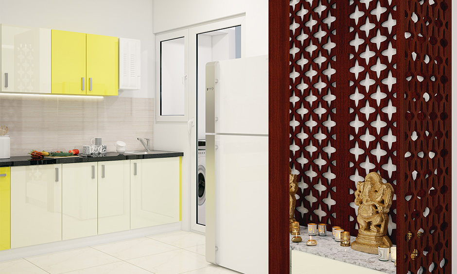 Small pooja room designs in kitchen attached to the kitchen that saves space