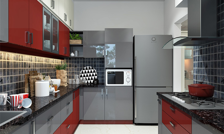 Black pearl granite kitchen countertops complement the grey and maroon cabinetry.