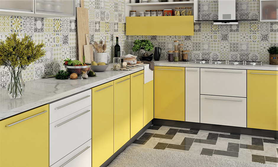 In yellow and white PVC member finish shutter in this modular kitchen is a super smooth finish and high water resistance.