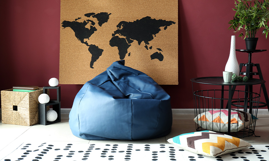 Floor seating ideas for living room, Blue coloured bean bag placed in the living room adds modern touch and comfort.
