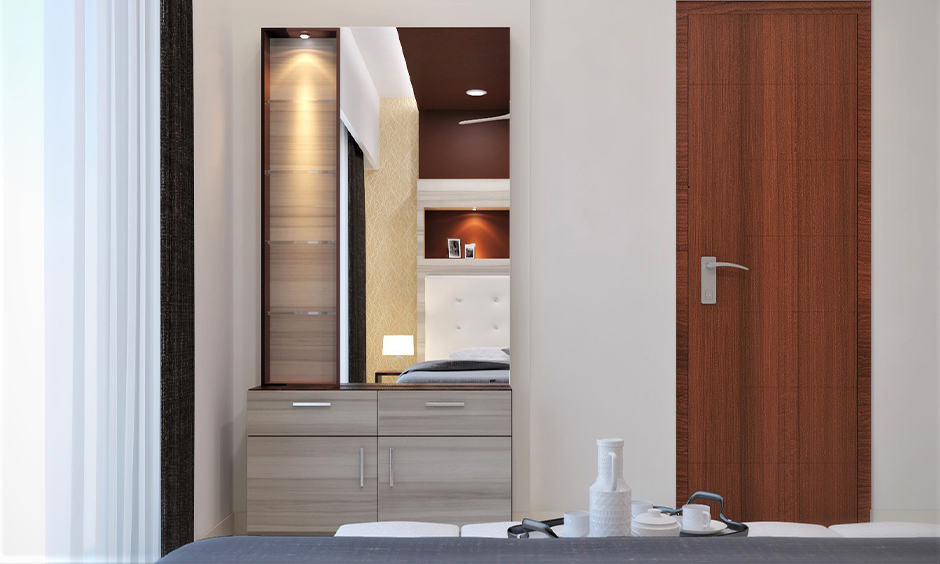 Simple dressing table designs with multiple shelves brings classy vibe into the bedroom