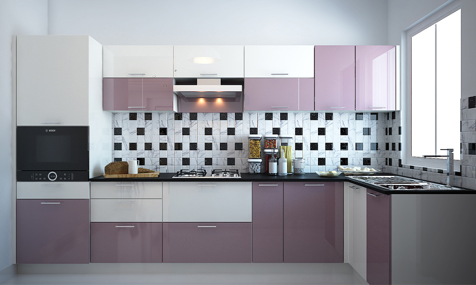 Glossy finish kitchen cabinets in white and light purple colour in the l-shaped kitchen look gorgeous.