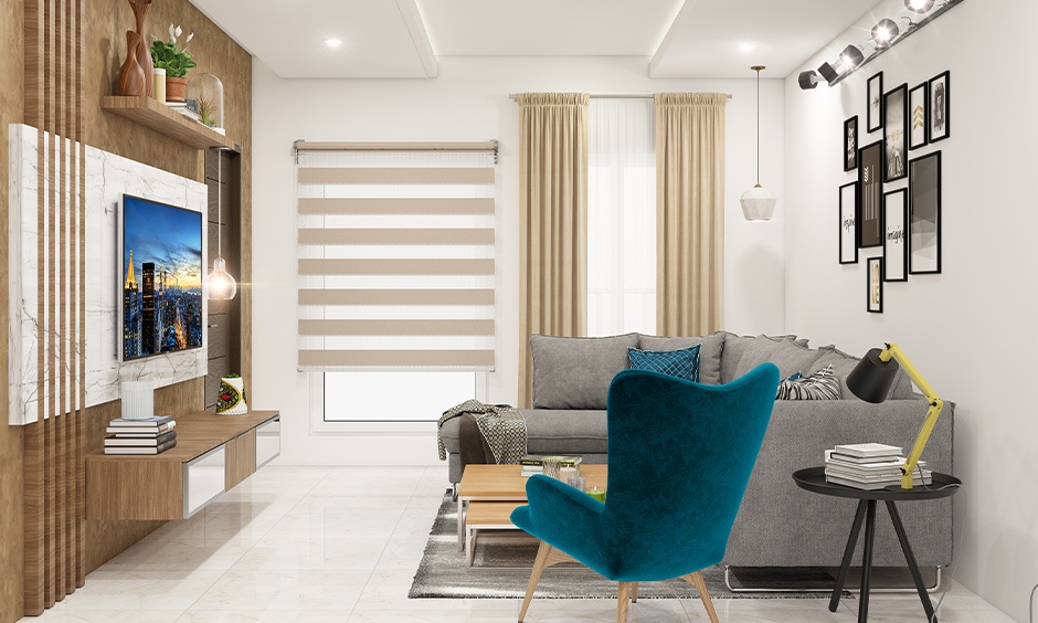 The hanging light at the corner of the small living room above the sofa looks chic, hanging lights for living room.