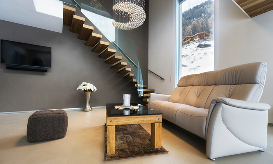 Floating contemporary staircase idea with glass handrail curvy design creates the awe-inspiring look