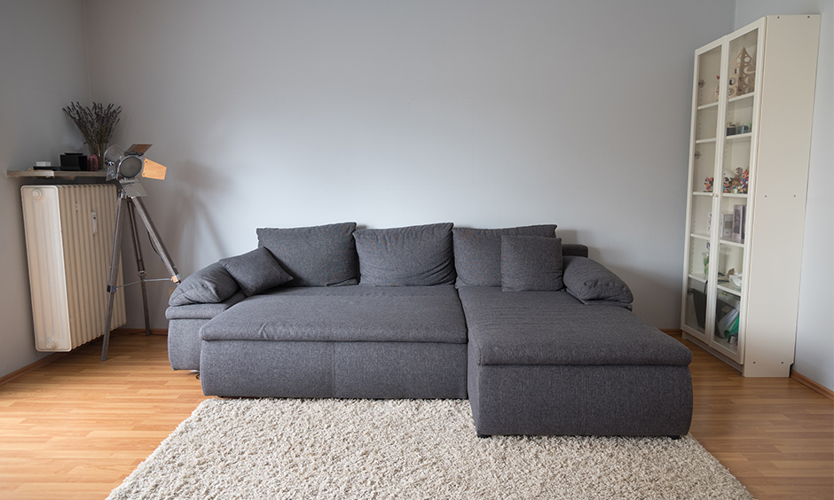Grey space-saving sofa bed to lounger sleep and repeat with the tv