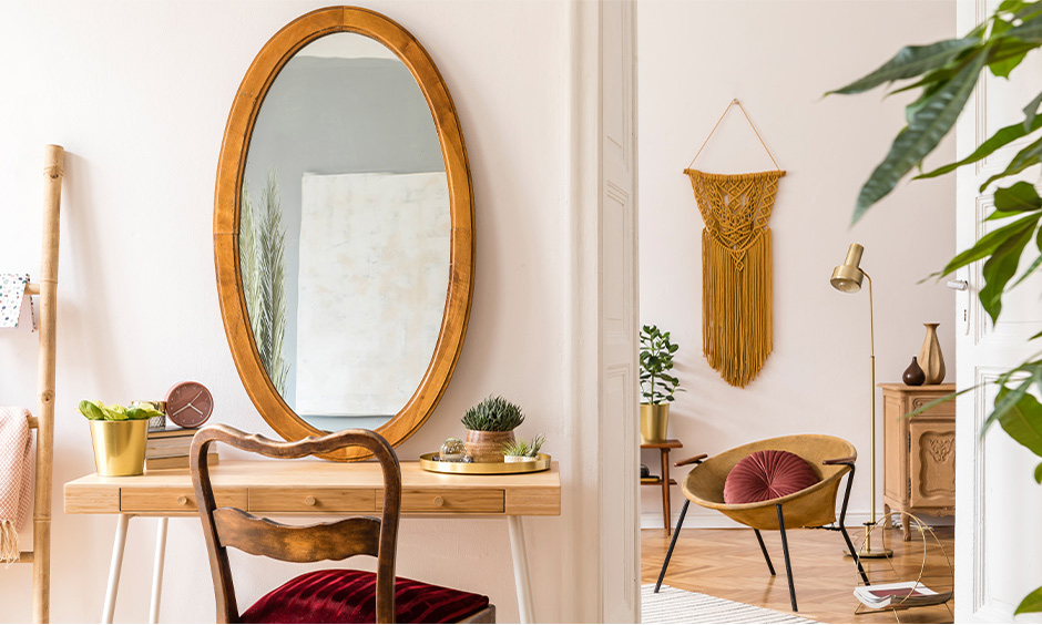 A modern home decorated with mirror item made from wood in oval-shaped