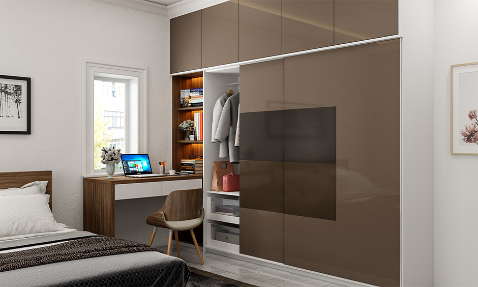 A space-saving wardrobe design that has a lavish floor-to-ceiling glossy finish wardrobe