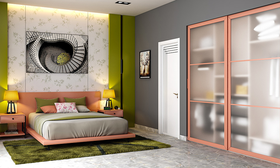 A space-saving wardrobe with a frosted glass door in the modern bedroom creates a spacious look.