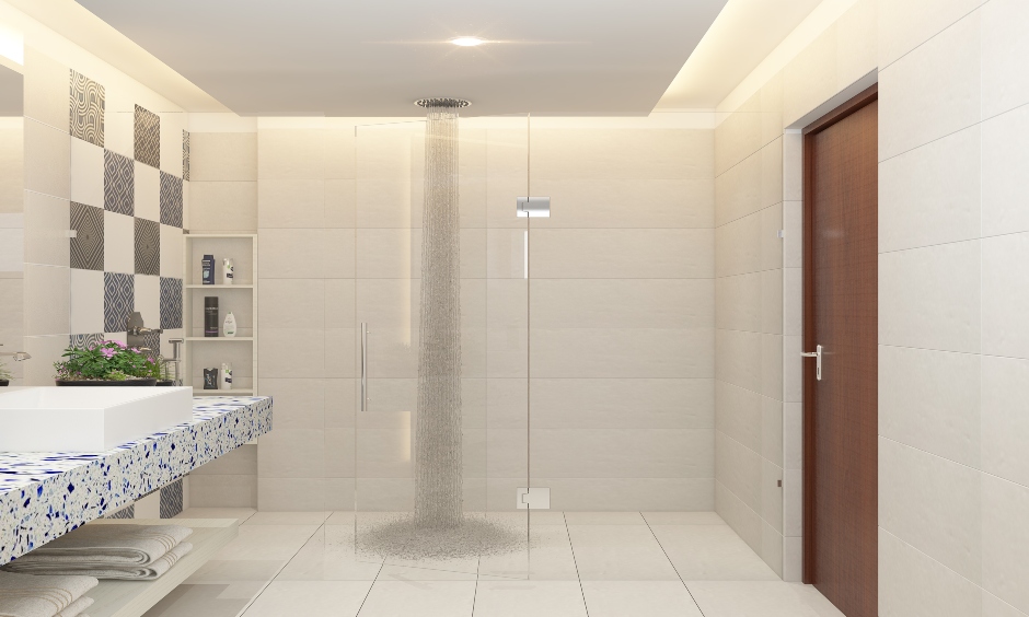 A glass door bathroom design between the vanity and shower area acts as a partition in a frameless design