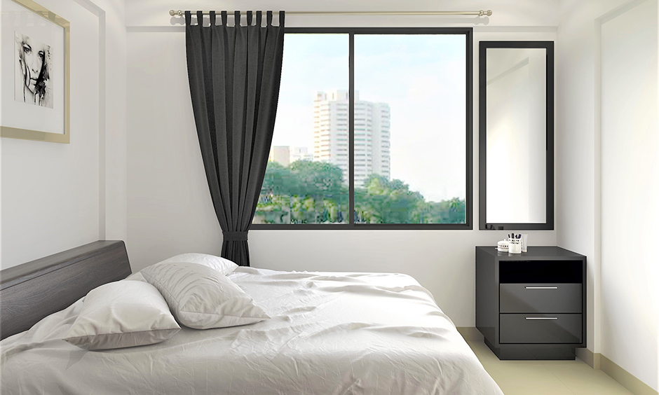 Modern dressing table design for small bedroom paired with simple mirror