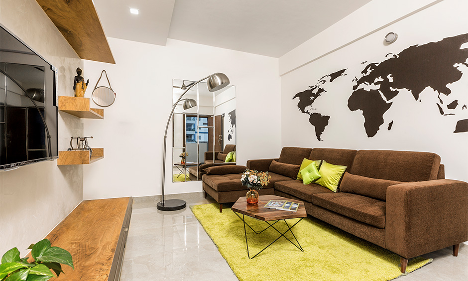 A bright-colored rug for living room in India gives a modern spin to space
