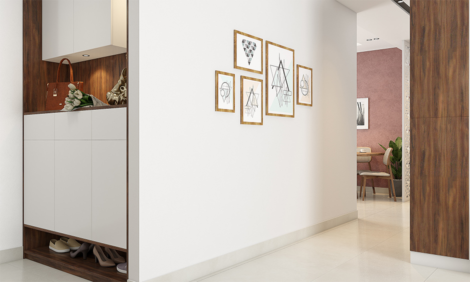 A floating entryway table with storage and lighting is functional and aesthetically pleasing