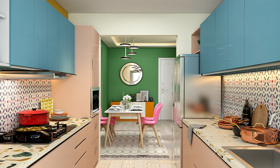 Pink kitchen in parallel shape with blue overhead cabinets
