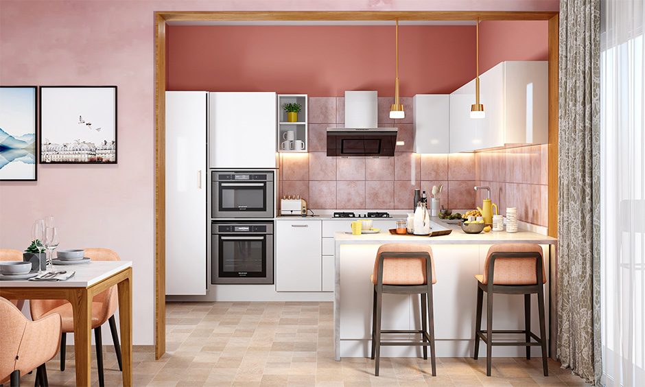 Pink l-shaped kitchen with breakfast counter for modern homes