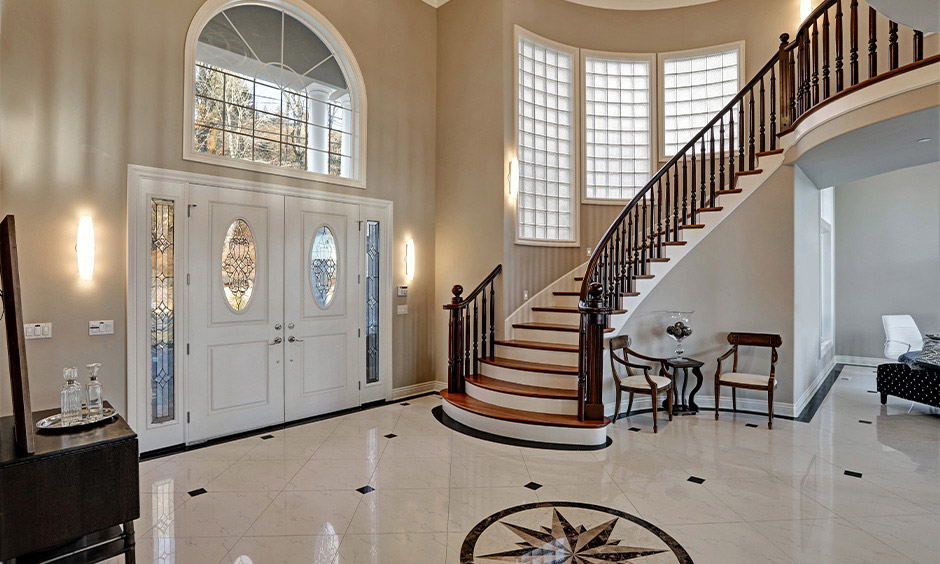 Wooden main door design with sidelights, adds aesthetic and functionality