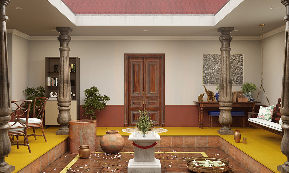 Wooden main double door in Indian style with intricate carvings and brass door handles
