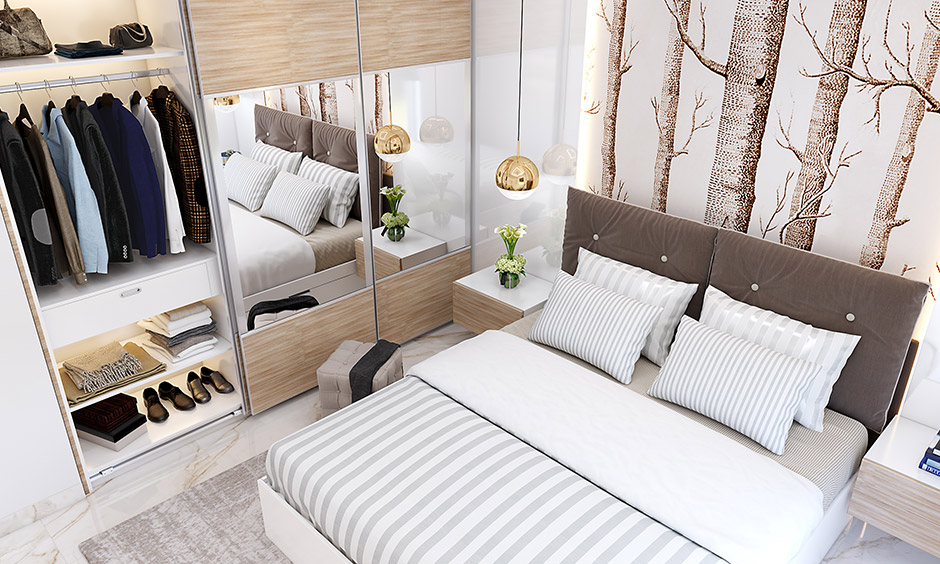 Compact bedroom features a wooden wall-fixing almirah with mirror-panelled doors