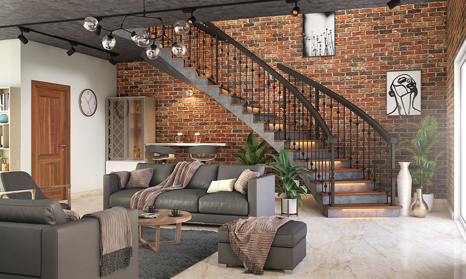 Industrial-style living room has a concrete staircase interior design with iron railings