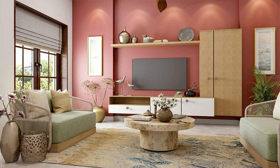 Living room has a European-style interior with a mixture of brass accent furniture, vases, and picture frames