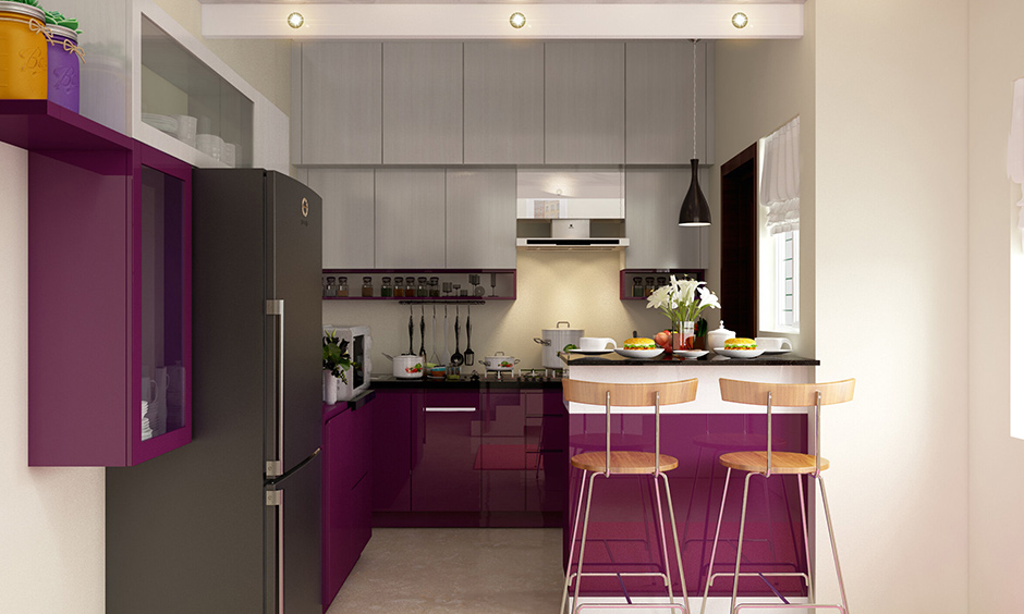 Grey kitchen with purple accent with some fresh flowers