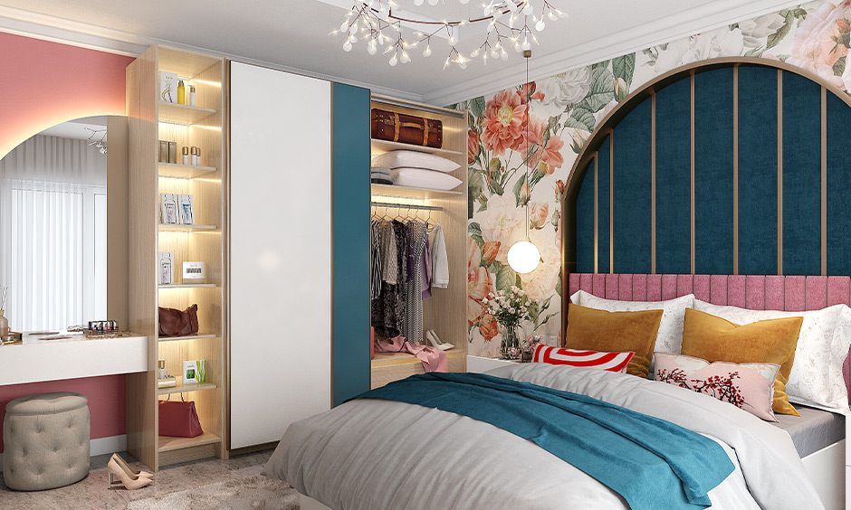 Bedroom wall moulding in metallic finish paired with a floral patterned wallpaper