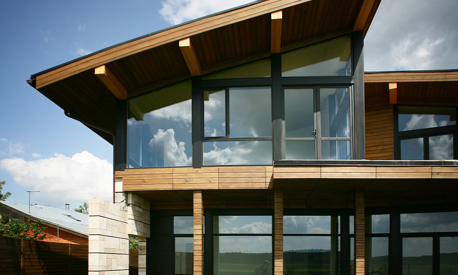 Tinted window glass design for home adds to the privacy where one cannot see the indoors from outside