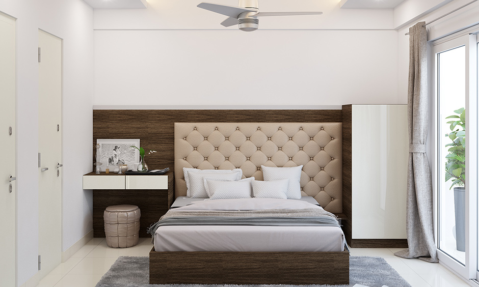 Tufted bed back wall design that adds a luxury touch