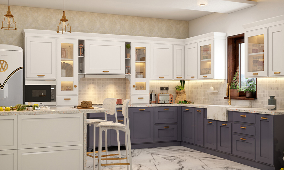 White kitchen with brass accents add a pop of royal colours