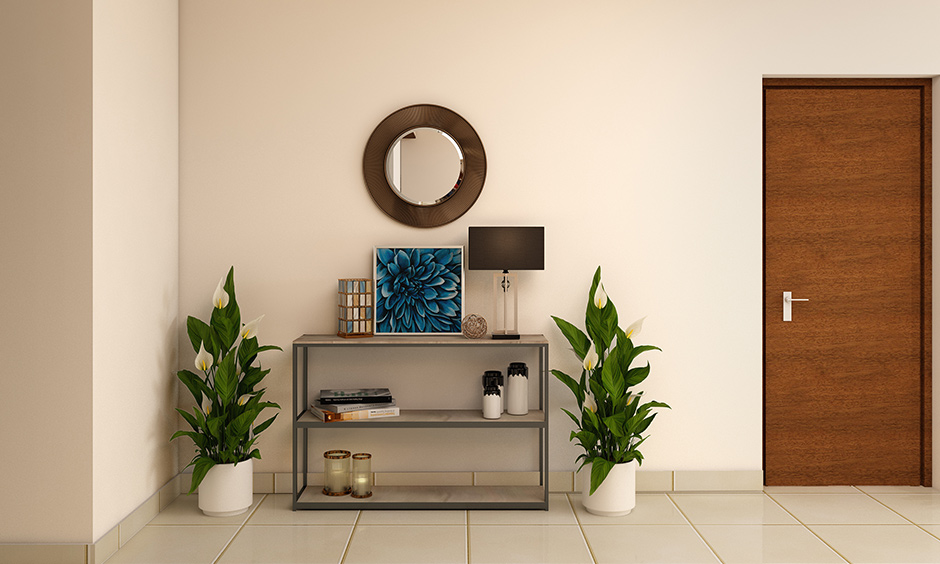 Accessorizing console table with items that complement the surrounding