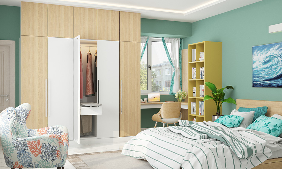Beach-themed bedroom in teal colour creates vacation vibes at home