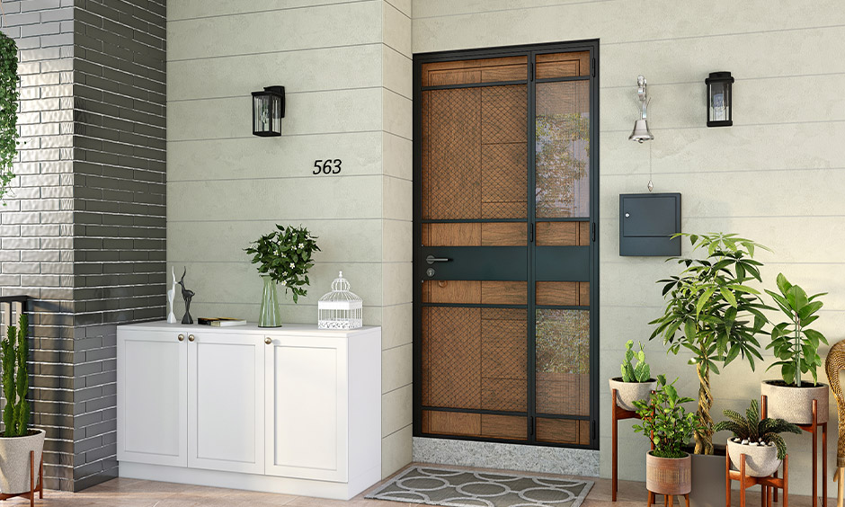 Double safety metal door design with mesh jali for additional security