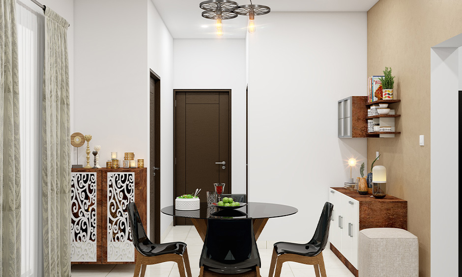 Black glass top kitchen table paired with four chairs