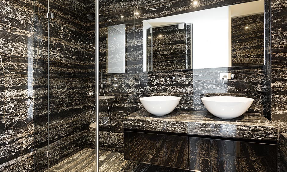 Industrial-style marble bathroom design with recessed lights